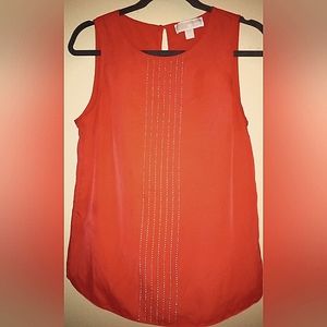 MK top Coral in color
